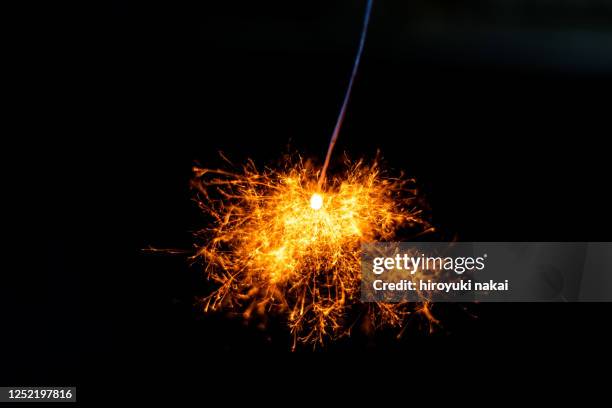 sparks of incense - bengalischer feuer stock-fotos und bilder