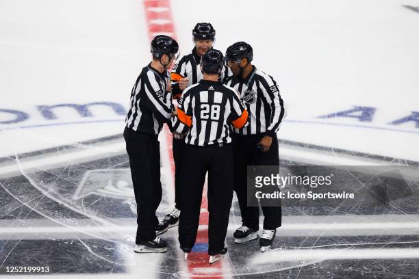 Referees during an NHL First Round Western Conference Playoff game between the Edmonton Oilers and the Los Angeles Kings on April 23 at the...