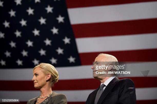 Republican presidential candidate Arizona Senator John McCain and his wife Cindy arrive at a rally in Miami, Florida, October 17, 2008. With 18 days...