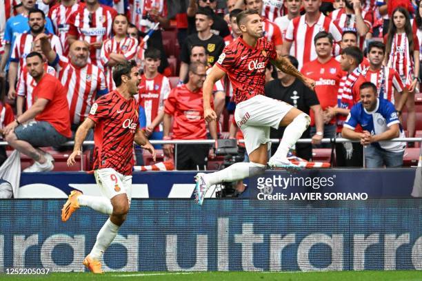 Real Mallorca's Serbian defender Matija Nastasic celebrates after scoring his team's first goal during the Spanish league football match between Club...