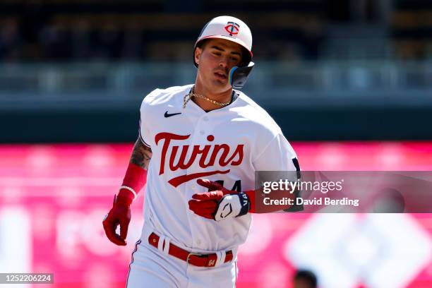 Jose Miranda of the Minnesota Twins rounds the bases on his solo home run against the New York Yankees in the second inning at Target Field on April...