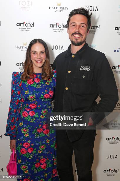 Jessica Brown Findlay and Ziggy Heath arrive at the art'otel London Battersea Power Station launch event on April 26, 2023 in London, England.