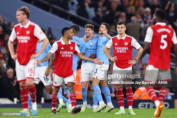 John Stones of Manchester City celebrates after scoring a goal to make it 2-0 during the Premier League match between Manchester City and Arsenal FC...