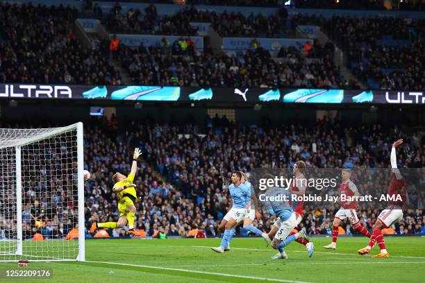 John Stones of Manchester City scores a goal to make it 2-0 during the Premier League match between Manchester City and Arsenal FC at Etihad Stadium...