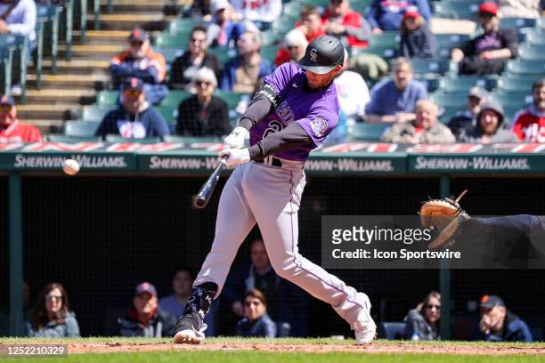 Colorado Rockies right fielder Kris Bryant singles to drive in a run during the sixth inning of the Major League Baseball Interleague game between...