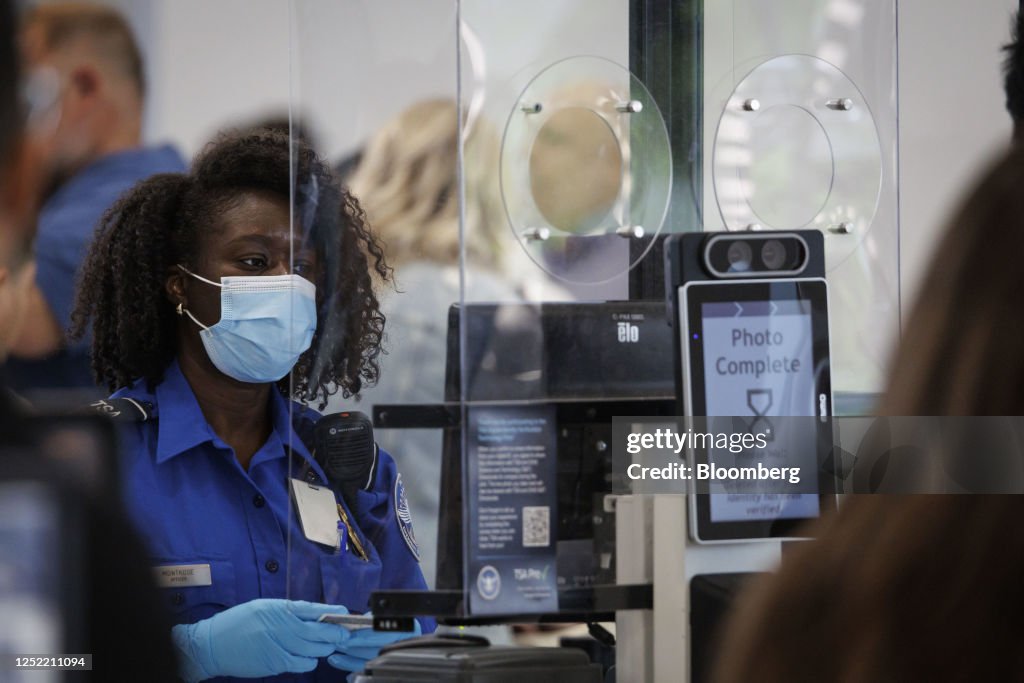 Tsa Program A Transportation Security Administration agent operates a Credential ...