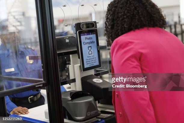 Credential Authentication Technology identity verification machine is demonstrated to a member of the media at a Transportation Security...
