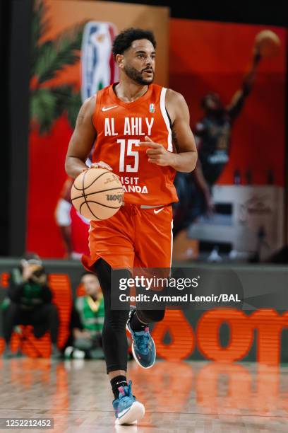 Corey Webster of the Al Ahly dribbles the ball during the game against the CFV - Beira on April 26, 2023 at the Dr Hassan Moustafa Sports Hall. NOTE...