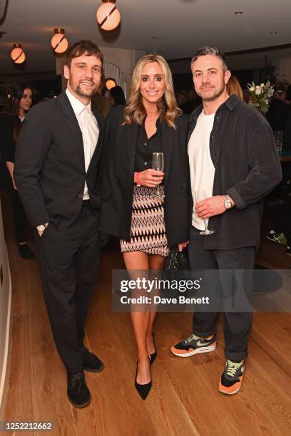 Nick Blood, Anna Woolhouse and Warren Brown attend the art'otel London Battersea Power Station launch event on April 26, 2023 in London, England.