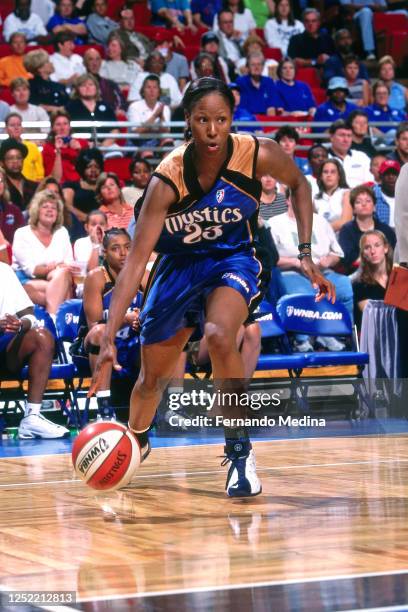 Chamique Holdsclaw of the Washington Mystics drives against the Orlando Miracle on June 23, 2001 at TD Waterhouse Centre in Orlando, Florida. NOTE TO...