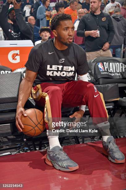 Donovan Mitchell of the Cleveland Cavaliers sits on the bench before the game against the New York Knicks during round 1 Game 5 of the 2023 NBA...