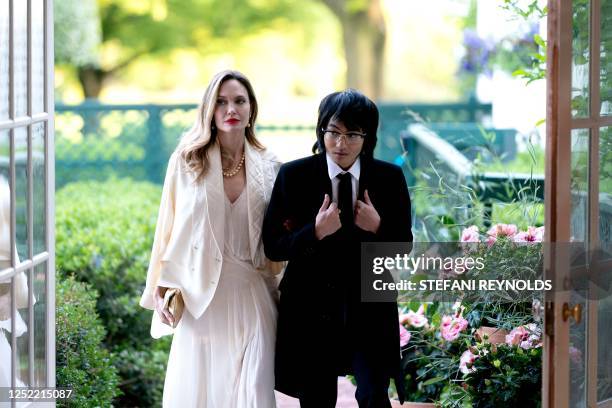 Actress Angelina Jolie and her son Maddox arrive for a State Dinner US President Joe Biden and US First Lady Jill Biden host for South Korean...