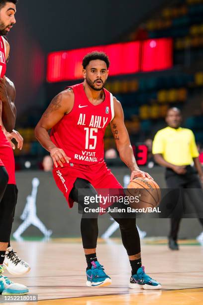 Corey Webster of the Al Ahly dribbles the ball during the game against the CFV - Beira on April 26, 2023 at the Dr Hassan Moustafa Sports Hall. NOTE...