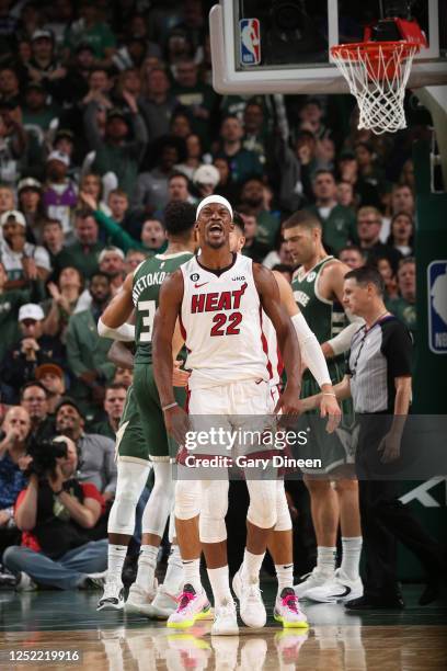 Jimmy Butler of the Miami Heat celebrates a play during Round One Game Five of the 2023 NBA Playoffs on April 26, 2023 at the Fiserv Forum Center in...