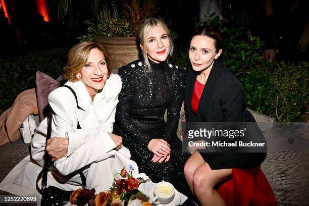 Lesli Linka Glatter, Lily Rabe and Elizabeth Olsen at the party for the Los Angeles premiere of "Love & Death" held at the Chateau Marmont on April...