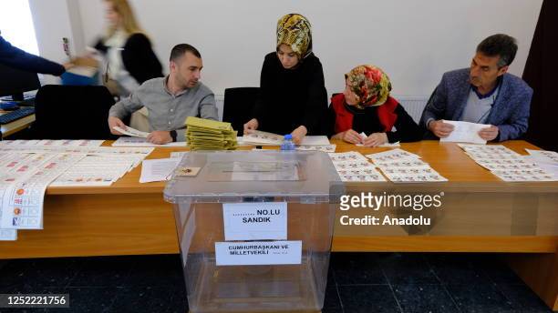 Election workers prepare ballots as Turks living abroad arrive to cast their votes in presidential and parliamentary elections at Derekoy Border Gate...