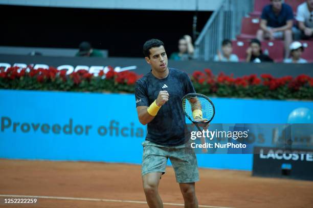 Jaume Munar of Spain in action against Thanasi Kokkinakis of Australian during first round at the Mutua Madrid Open 2023 tennis tournament on April...