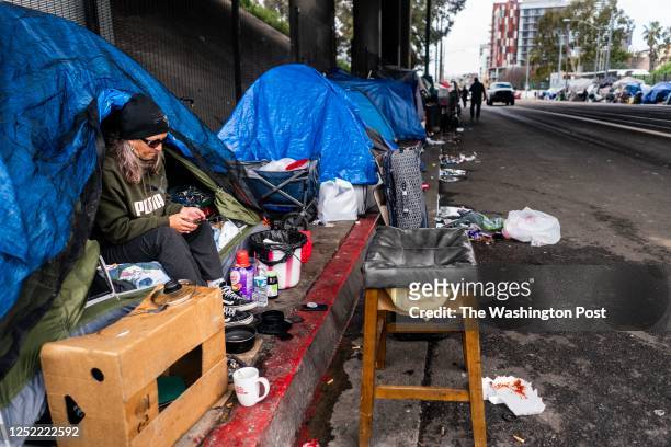 Rachel Hayes lives under and near a freeway overpass along with hundreds of other people in a homeless encampment in downtown San Diego, California...