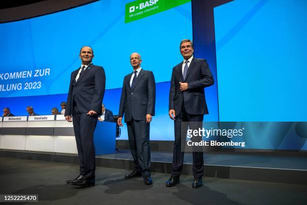 Martin Brudermueller, chief executive officer of BASF SE, left, Kurt Bock, chairman of BASF SE, center, and Hans-Ulrich Engel, chief financial...