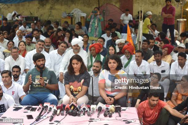 Wrestlers Bajrang Punia, Vinesh Phogat, Sakshi Malik, and others addressing media persons during forth day dharma their protest against the Wrestling...