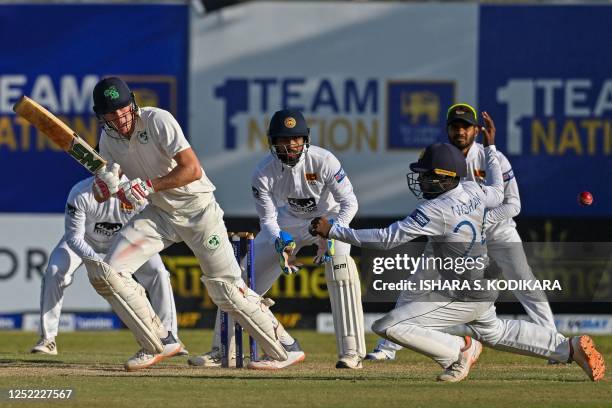 Ireland's Harry Tector plays a shot during the fourth day of the second and final cricket Test match between Sri Lanka and Ireland at the Galle...