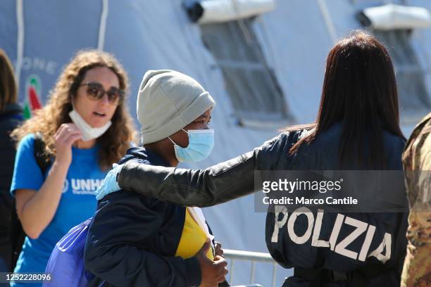 Migrant during the checks after disembarking in Naples, from the Geo Barents rescue ship, after being saved from a shipwreck in the Mediterranean sea.