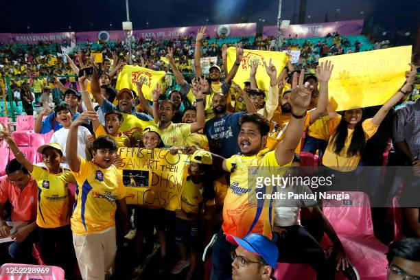 Fans cheer during the IPL match between Rajasthan Royals and Chennai Super Kings at Sawai Mansingh Stadium on April 27, 2023 in Jaipur, India.