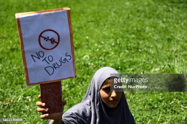 Locals and Students from different schools take part in Anti Drug Rally In Sopore District Baramulla Jammu and Kashmir India on 26 April 2023....