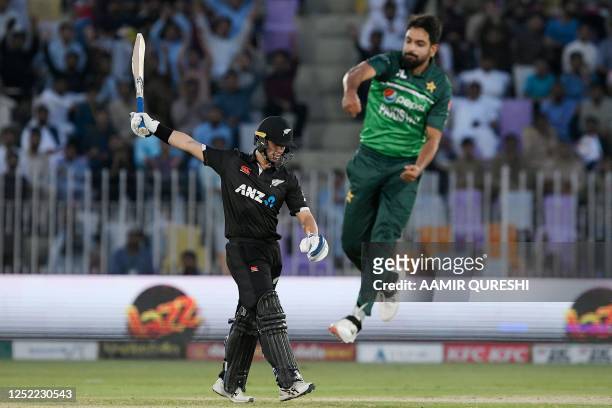 New Zealand's Mark Chapman gestures after his dismissal by Pakistan's Haris Rauf during the first one-day international cricket match between...