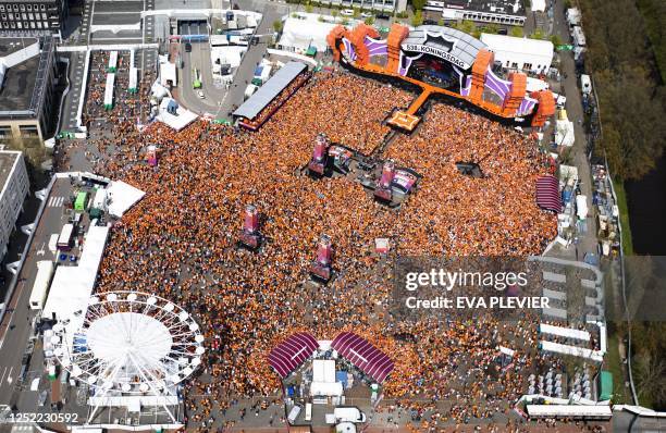 This aerial photograph shows visitors gathering for a festival during the King's Day party of Radio 538 on the Chasseveld square in Breda, on April...