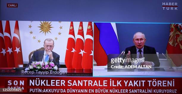 This photograph taken on April 27 shows a screen in Ankara broadcasting the live feed of Turkish channel Haber Turk, showing President of the...