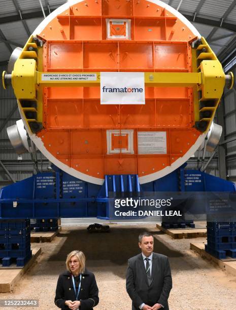 French Minister for Energy Transition, Agnes Pannier-Runacher speaks beside Luc Remont, CEO of EDF , in front of a nuclear reactor built by framatome...