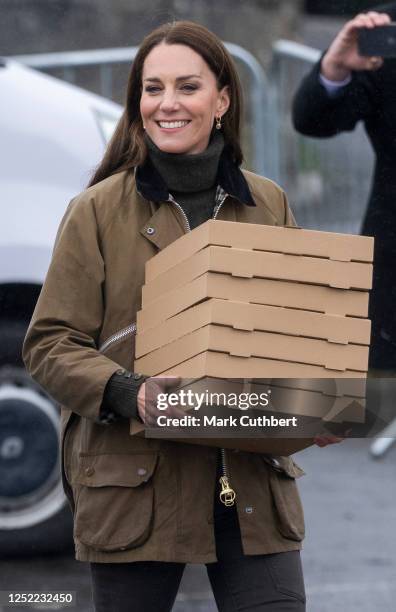 Catherine, Princess of Wales visits the Dowlais Rugby Club where members of the Central Beacons Mountain Rescue Team typically go to relax and...