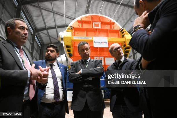 Luc Remont, CEO of EDF , stands in front of a nuclear reactor built by framatome during a visit to Hinkley Point C nuclear power station near...