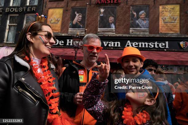 People celebrate King's Day on April 27, 2023 in Amsterdam, Netherlands. April 27 marks the birthday of King Willem Alexander of The Netherlands....