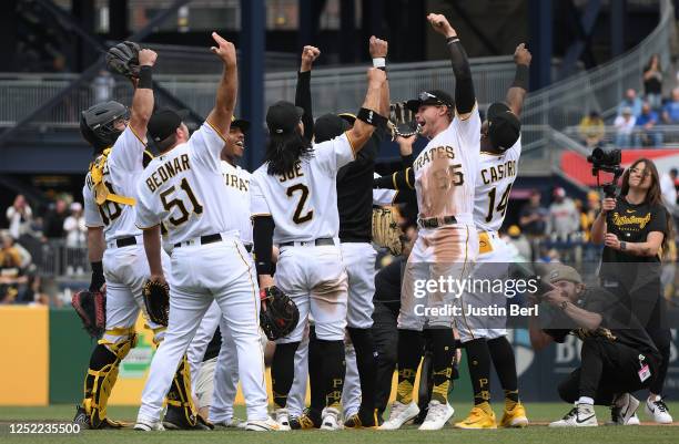 The Pittsburgh Pirates celebrate following a 6-2 win over the Los Angeles Dodgers during the game at PNC Park on April 27, 2023 in Pittsburgh,...