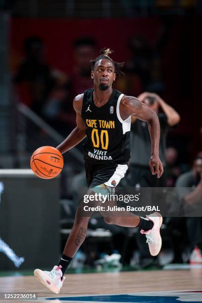 Zaire Wade of the Cape Town Tigers dribbles the ball during the game against the SLAC on April 27, 2023 at the Dr Hassan Moustafa Sports Hall. NOTE...