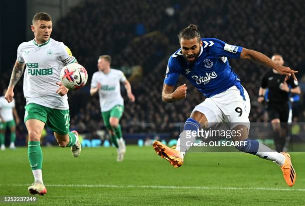 Everton's English striker Dominic Calvert-Lewin shoots but fails to score during the English Premier League football match between Everton and...
