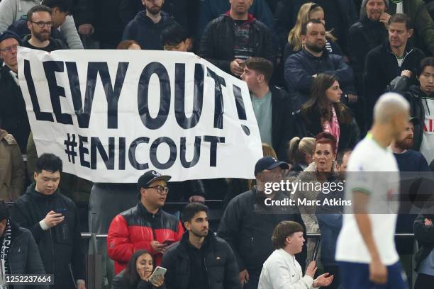 Fans display a banner directed at Tottenham Hotspur chairman Daniel Levy during the Premier League match between Tottenham Hotspur and Manchester...