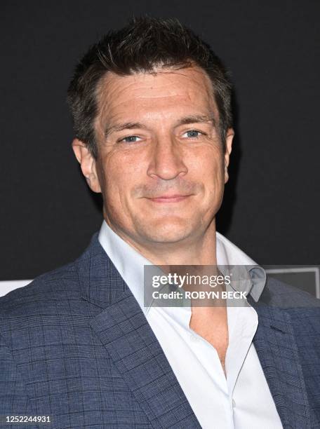 Canadian actor Nathan Fillion arrives for Marvel Studios' "Guardians of the Galaxy Vol. 3" world premiere at the El Capitan Theatre in Hollywood,...