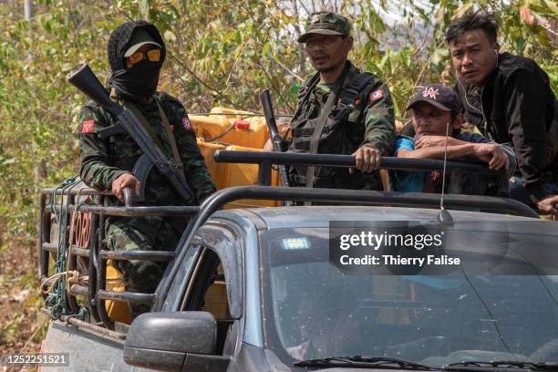 Soldiers from the Karenni Army are ridding a truck on their way to a military operation against the Burmese army. The Karenni Army is the armed wing...