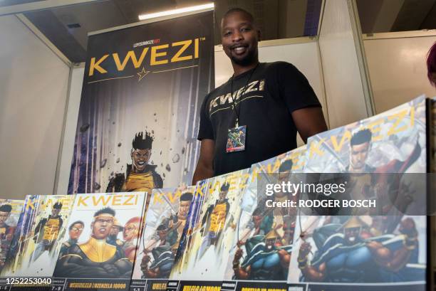 Loyiso Mkhize, author of Kwezi comics poses for a photograph at ComicCon Cape Town, on April 27, 2023. - Cape Town hosts Comic-Con Africa, the...