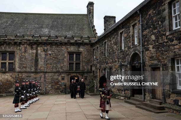 Piper leads the procession as the Stone of Destiny is carried during a special ceremony in Edinburgh Castle on April 27, 2023 before it is...