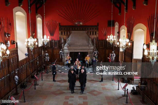 The Stone of Destiny is carried out of the Great Hall in Edinburgh Castle on April 27, 2023 during a special ceremony before being transported to...