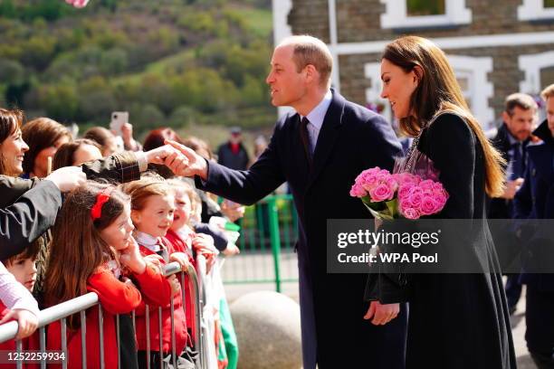 Prince William, Prince of Wales and Catherine, Princes of Wales during a visit to the Aberfan memorial garden, to pay their respects to those who...