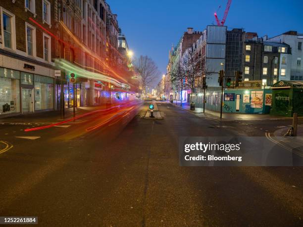 Light trails from passing vehicles outside a construction site on Oxford Street in London, UK, on Sunday, Jan. 22, 2023. Oxford Street is meant to be...