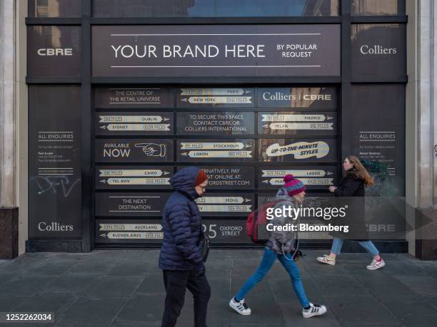 Pedestrians pass an empty retail space available for lease in London, UK, on Sunday, Jan. 22, 2023. Oxford Street is meant to be "the jewel in...