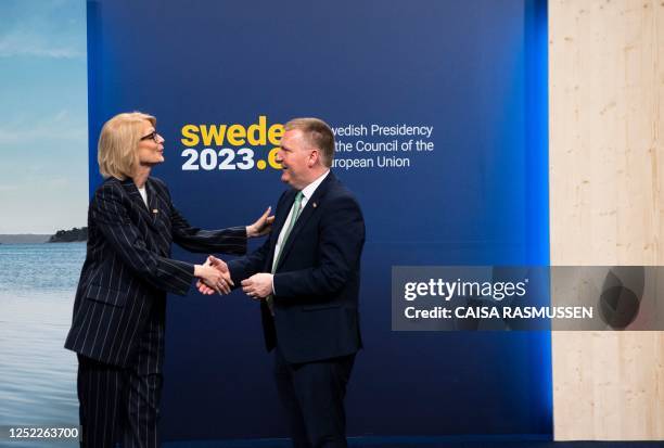 Sweden's Finance Minister Elisabeth Svantesson receives Michael McGrath, Minister for Finance of Ireland, as he arrives to attend an informal meeting...