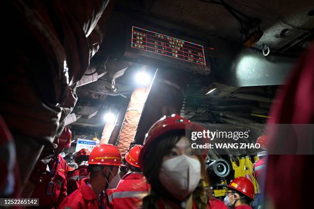 This photo taken on April 26, 2023 shows a remotely-driven car driving underground at the Xiaobaodang coal mine near Yulin, in China's northern...