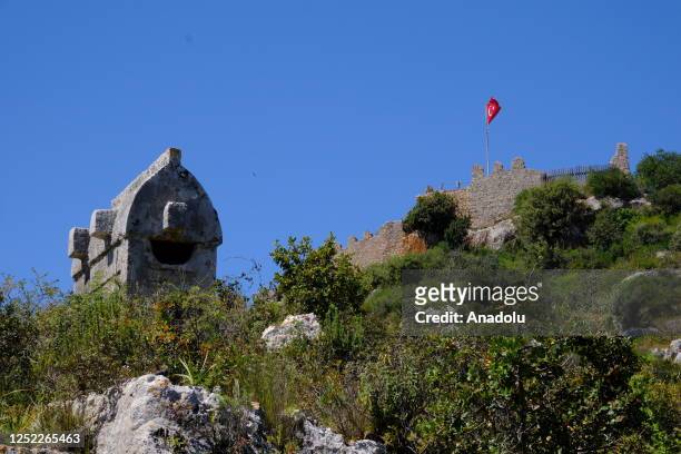 View of monument in Simena ancient city at Lycian Way in Antalya, Turkiye on April 15, 2023. The Lycian Way, which is considered one of the "best 10...